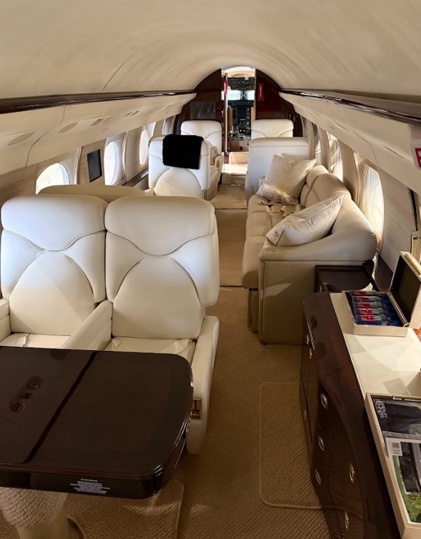 Private jet cabin interior with cleaned and conditioned leather seating